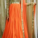 Orange Anarkali Suit with golden choli