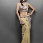 Stitched yellow sari with heavy crystal blouse