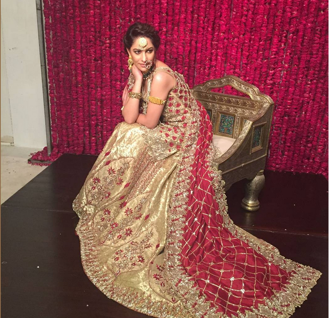 cream and red bridal lehenga