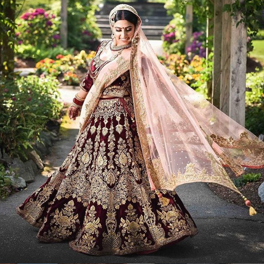 Bride in a Beautiful Wine Colored Lehenga with Matching Long Dupatta |  Indian bridal dress, Bridal lehenga red, Indian bridal outfits
