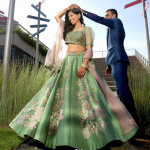 European green  lehenga, for her sangeet.