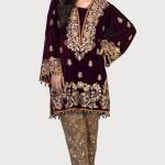 Plum velvet shirt and brown organza pants.