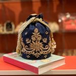 Potli with embroidery work and pearl handl