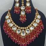 Maroon color kundan set
