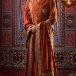Rust color silk kurta and waist coat