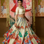 Beige colour lehenga with an elephant and parrot embroidery