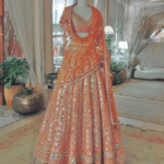 Orange colour mirror work wedding lehenga