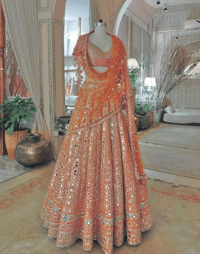 Orange colour mirror work wedding lehenga