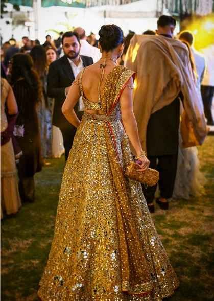 Golden color wedding lehenga - Image 2
