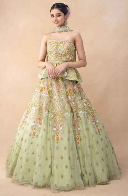Green thread embellished peplum lehenga set