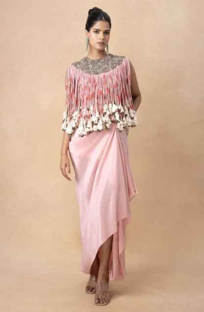 Pink embellished cord top with a draped skirt