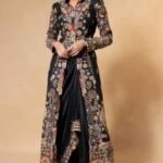 Black embellished jacket with an asymmetric skirt