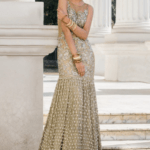 Beautiful embroidered Asian bridal out in alluring gold color