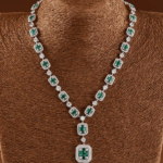 White Finish Zircon & Synthetic Emerald Necklace Set In Sterling Silver