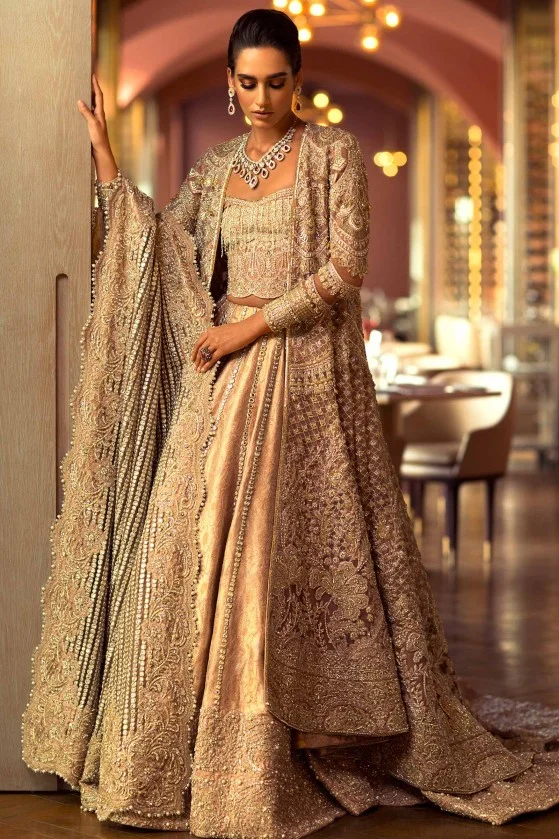 Golden color lehenga with jacket