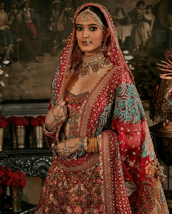 Deep red lehenga with floral and avian motifs - Image 2