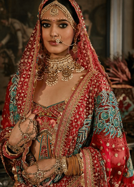 Deep red lehenga with floral and avian motifs - Image 4