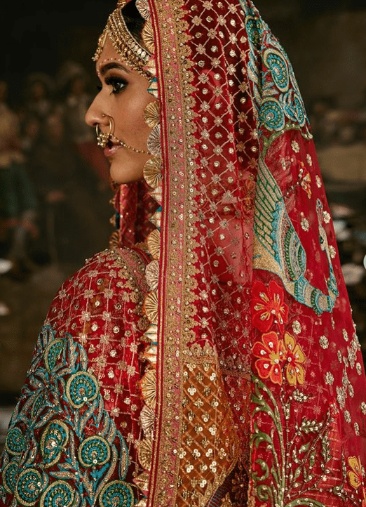 Deep red lehenga with floral and avian motifs - Image 5