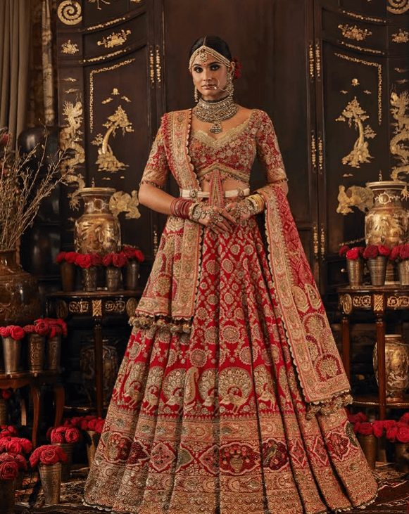 Red lehenga with tulle veil