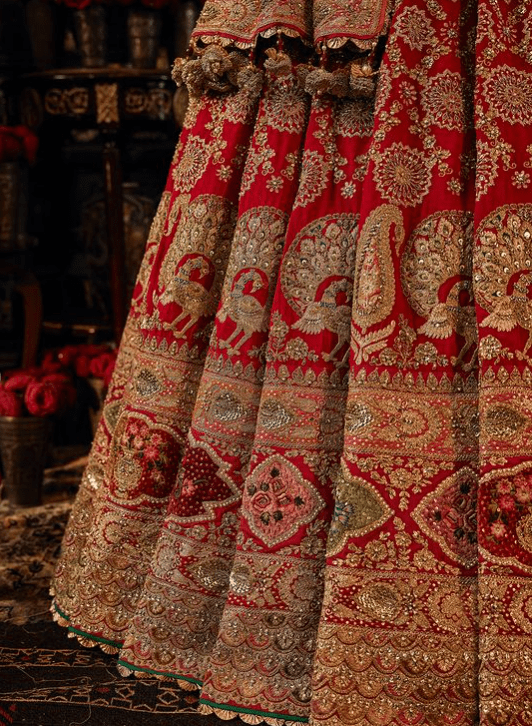 Red lehenga with tulle veil - Image 5