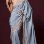 A Perfectly Crafted Powder Blue Crepe Silk Saree