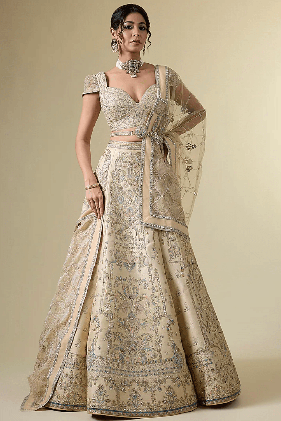 Gold Raw Silk Tribal Motif Hand & Machine Embroidered Lehenga Srt
