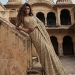 Cream color saree with hand work